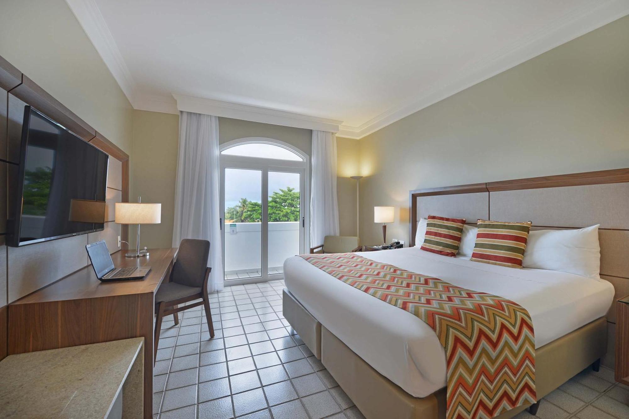 Hotel Deville Prime Salvador Exterior foto A room at the hotel